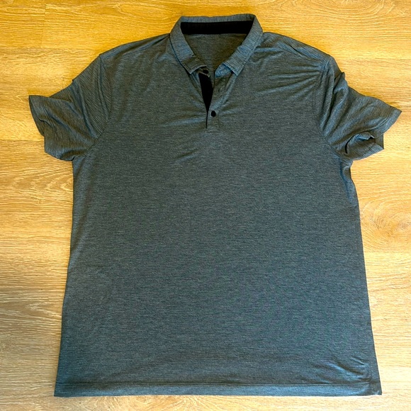 Men’s polo. Small tear near logo. - Picture 1 of 4